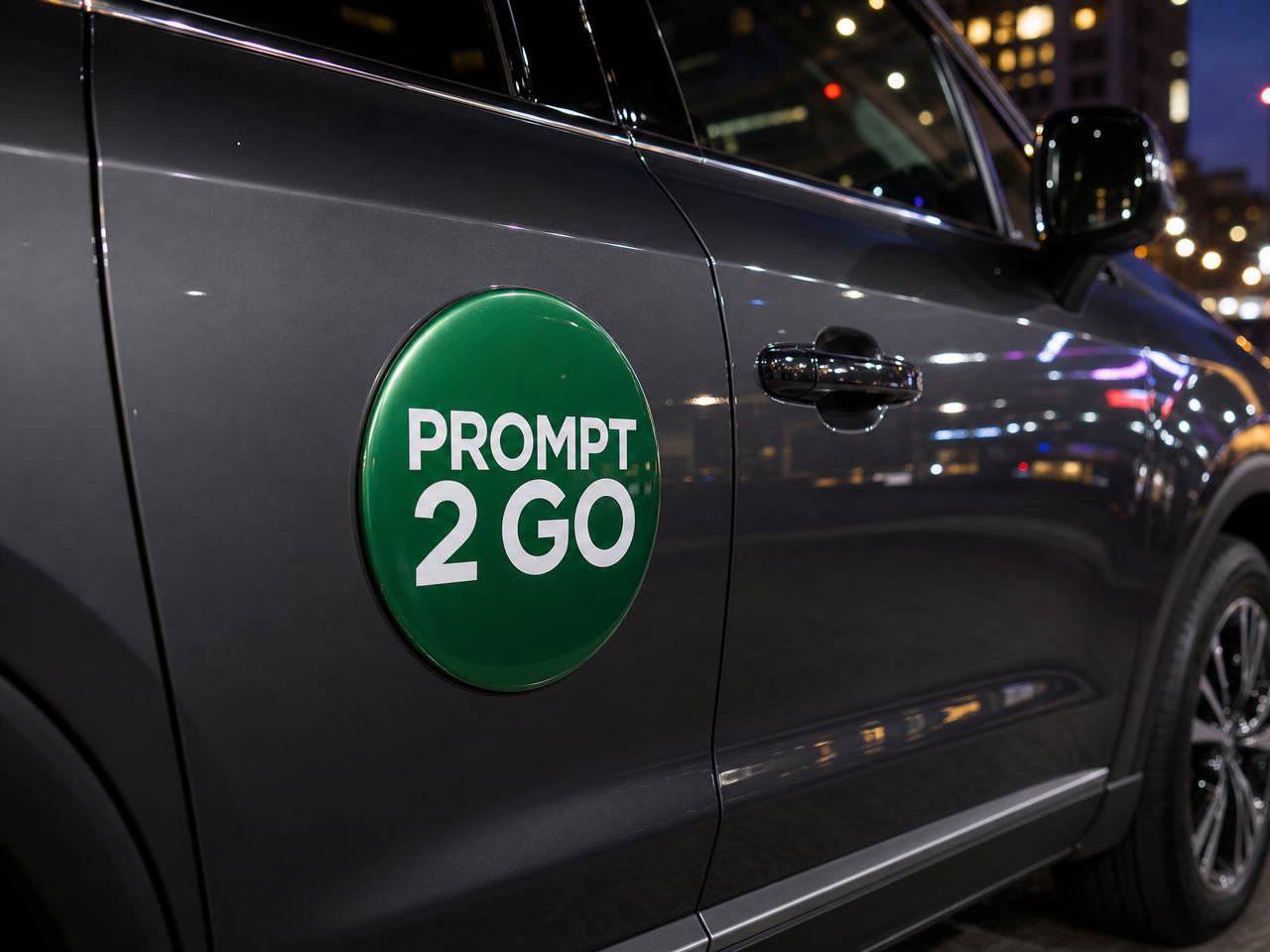 Emerald Prompt 2 Go door magnet on a dark SUV